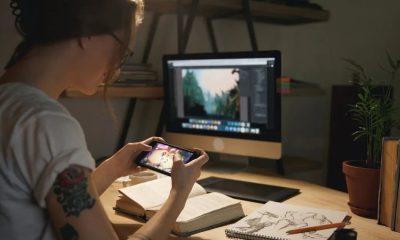 girl playing game on mobile