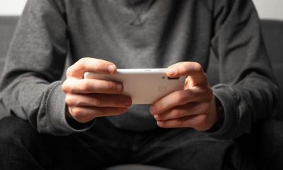 man playing on mobile